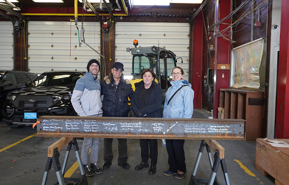 Finegold Alexander Architects celebrates at beam signing ceremony for J.V. Fletcher Library project